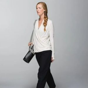 Lululemon long sleeve shirt, size 4 with bottom closure cross in front